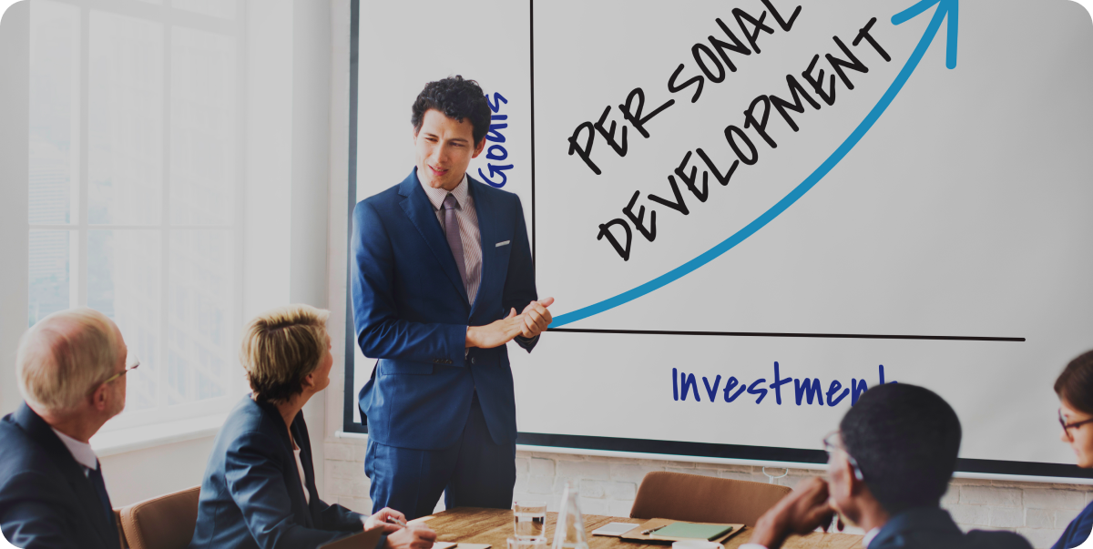 Professional Growth – Dentist presenting growth chart